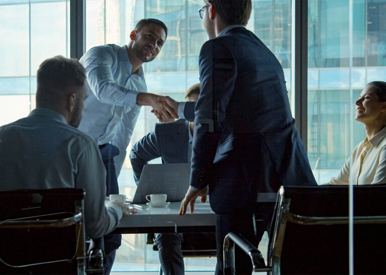 sample_0001_young-business-negotiators-shaking-hands-with-part-2022-07-01-12-52-02-utc.jpg